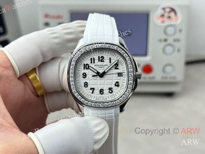 High Quality Replica PATEK PHILIPPE Aquanaut Luce White Integrated Composite Strap White Embossed Pattern Face Dial 48 Diamonds Inlaid Round Octagonal Case Watch 38mm